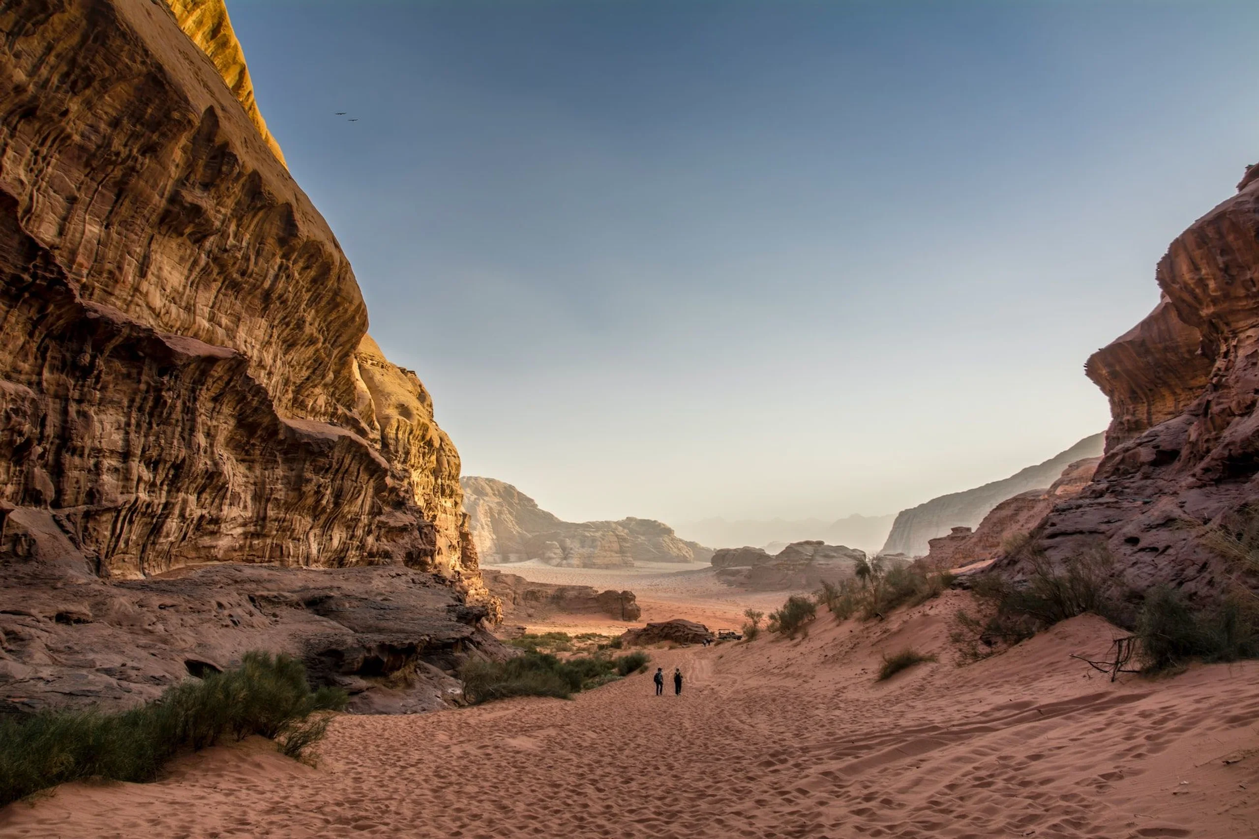 Desert valley surrounded by mountains in the Wadi Rum Reserve in Jordan