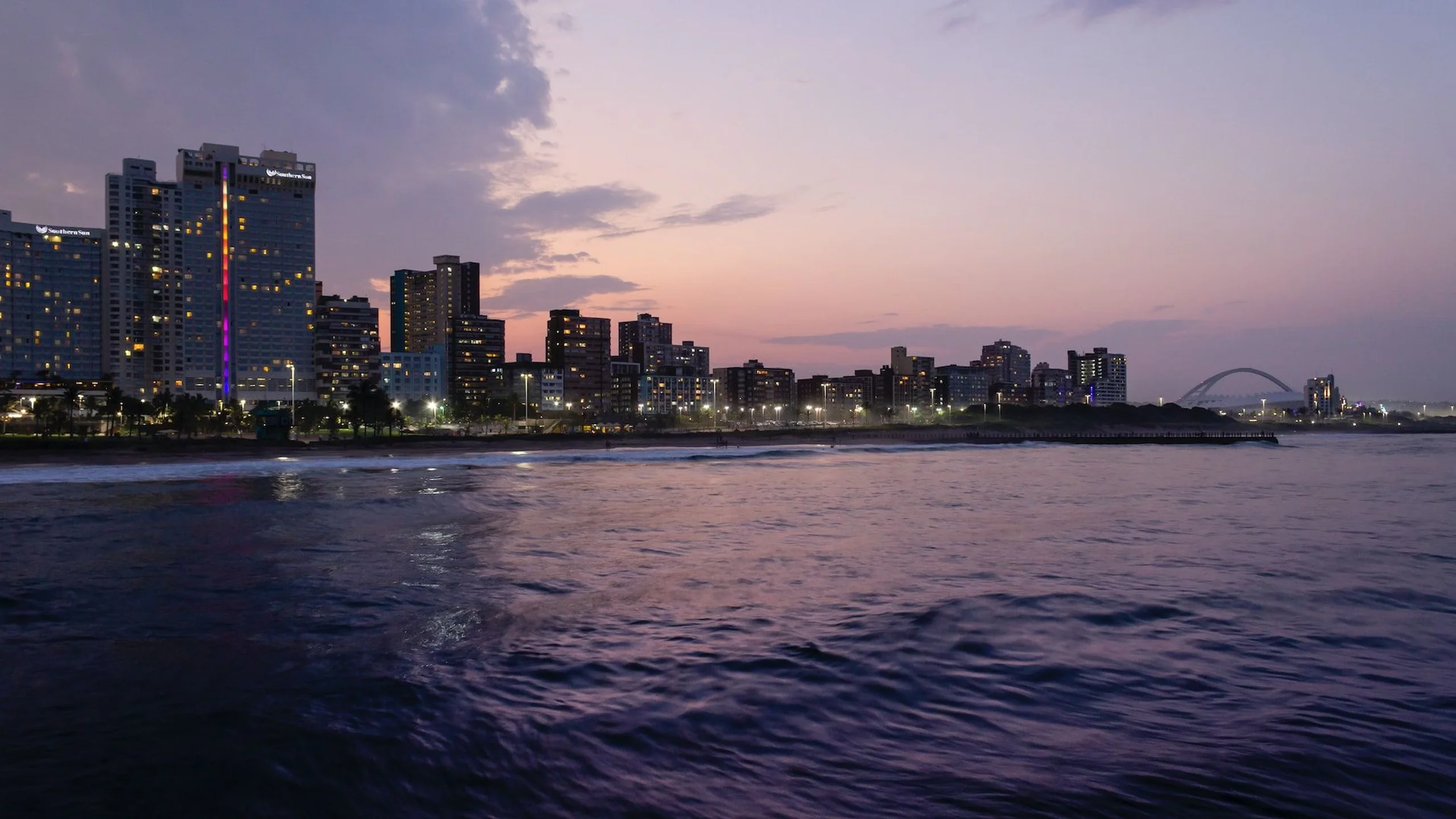 Durban coast and city skyline seen form the ocean after sunset